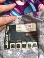 Polovna Lego jakna za zimu ljubicasta sa plavim i roze tufnama, velicine 92.