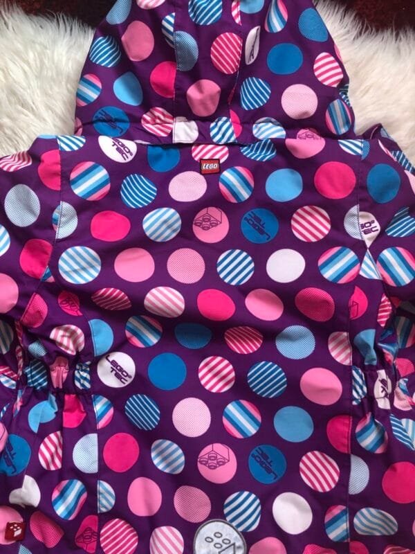 Polovna Lego jakna za zimu ljubicasta sa plavim i roze tufnama, velicine 92.