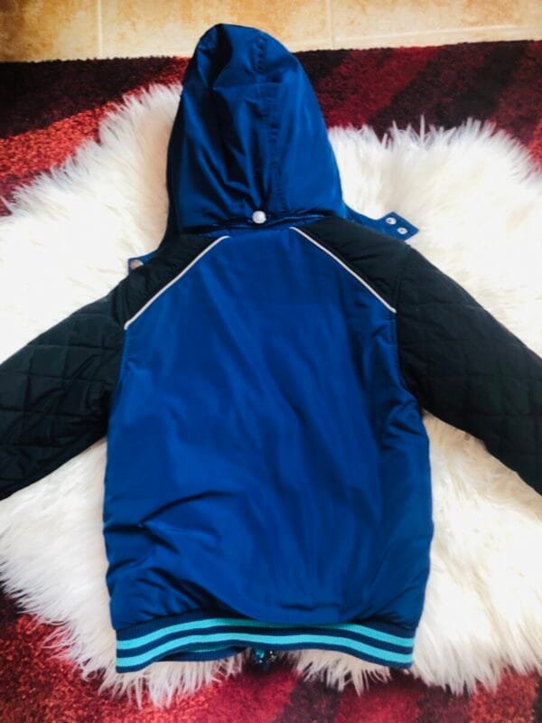 Polovna plava jakna za decake Kanz velicine 104.