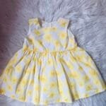 Haljina sa zutim cvetovima velicine 68.