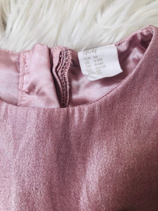 Elegantna roze haljinica velicine 68.