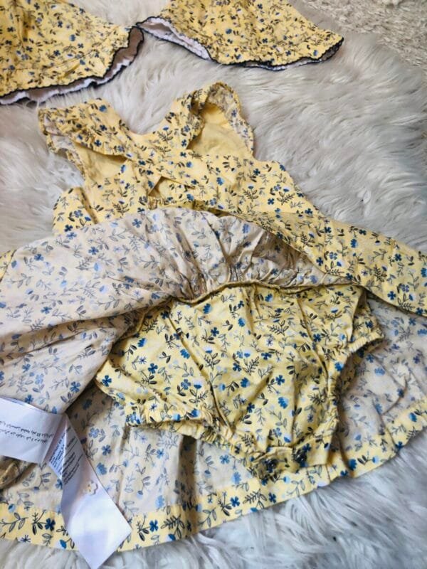 Sergent Major haljina zuta sa cveticima i sesirima, velicine 80.